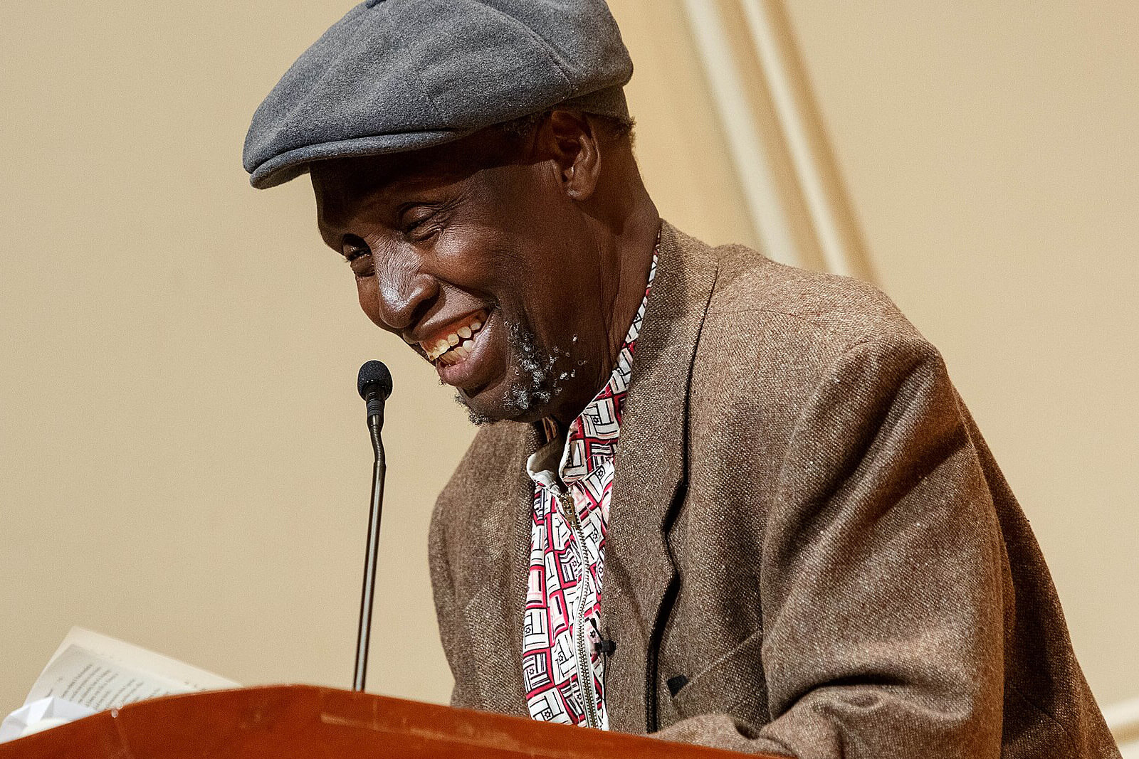 Renowned Kenyan writer Ngũgĩ wa Thiong'o reads excerpts from his recent work in both Gikuyu and English during a presentation in the Coolidge Auditorium, May 9, 2019. Photo by Shawn Miller/Library of Congress.